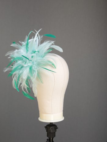 Ladies wedding or races aqua and emerald green small feather and satin loop fascinator hat