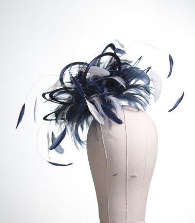 Ladies formal Navy Blue and White medium feather and satin loop fascinator hat. Suitable for a wedding or ladies day at the races