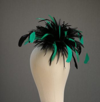 Ladies wedding or races black and emerald green small feather and satin loop fascinator hat