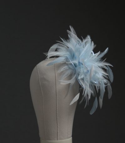 Ladies wedding or races baby blue and white small feather and satin loop fascinator hat