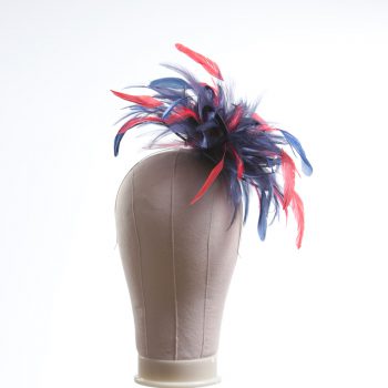 navy blue and red small hackle fascinator hat with feathers set on a headband