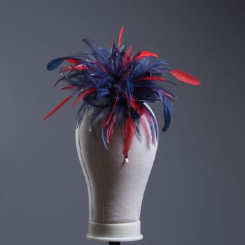 navy blue and red small hackle fascinator hat with feathers set on a headband