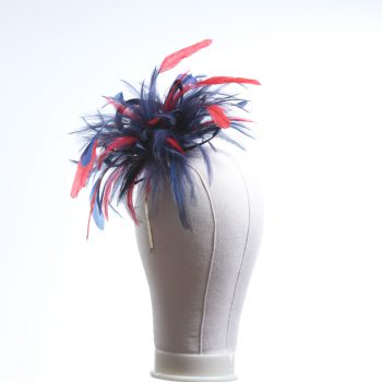 navy blue and red small hackle fascinator hat with feathers set on a headband