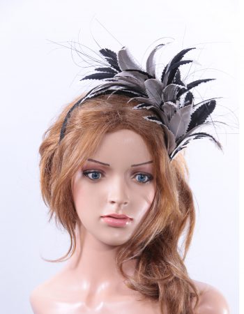 black and pale grey feather mount headband suitable for a wedding or ladies day at the races