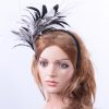 black and pale grey feather mount headband suitable for a wedding or ladies day at the races