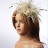 cream and olive moss green sinamay and feather fascinator hat