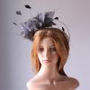 pewter grey feather mount on a black halo crown headband