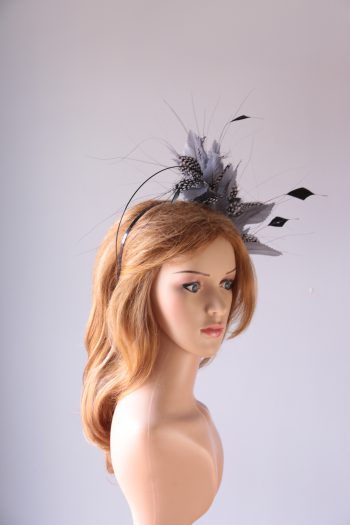 pewter grey feather mount on a black halo crown headband