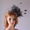 pewter grey feather mount on a black halo crown headband