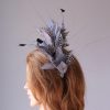 pewter grey feather mount on a black halo crown headband