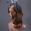 pewter grey feather mount on a black halo crown headband