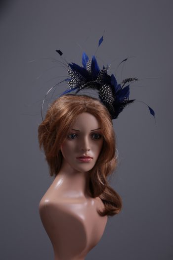 royal blue and black feather mount on a silver halo crown