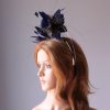 royal blue and black feather mount on a silver halo crown