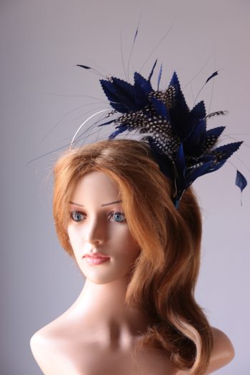 royal blue and black feather mount on a silver halo crown