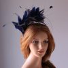 royal blue and black feather mount on a silver halo crown