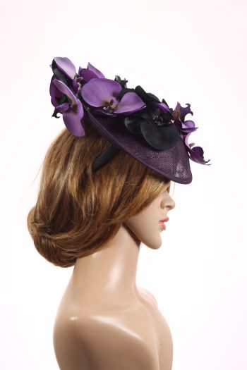 Aubergine sinamay saucer fascinator hatinator hat with purple and black orchid flowers