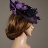 Aubergine sinamay saucer fascinator hatinator hat with purple and black orchid flowers