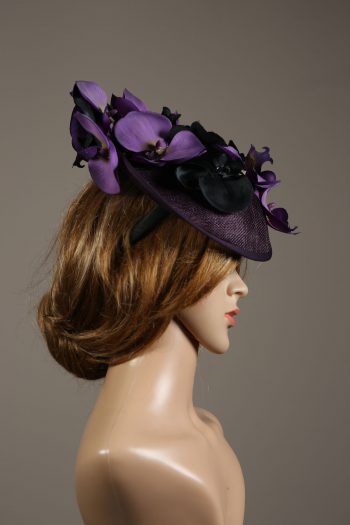 Aubergine sinamay saucer fascinator hatinator hat with purple and black orchid flowers