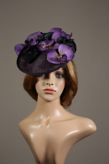 Aubergine sinamay saucer fascinator hatinator hat with purple and black orchid flowers