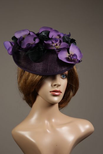 Aubergine sinamay saucer fascinator hatinator hat with purple and black orchid flowers