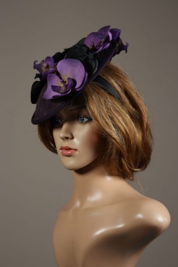 Aubergine sinamay saucer fascinator hatinator hat with purple and black orchid flowers