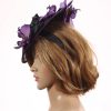Aubergine sinamay saucer fascinator hatinator hat with purple and black orchid flowers