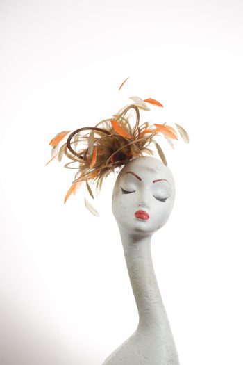 Gold satin Loop Fascinator Hat with gold and orange feathers