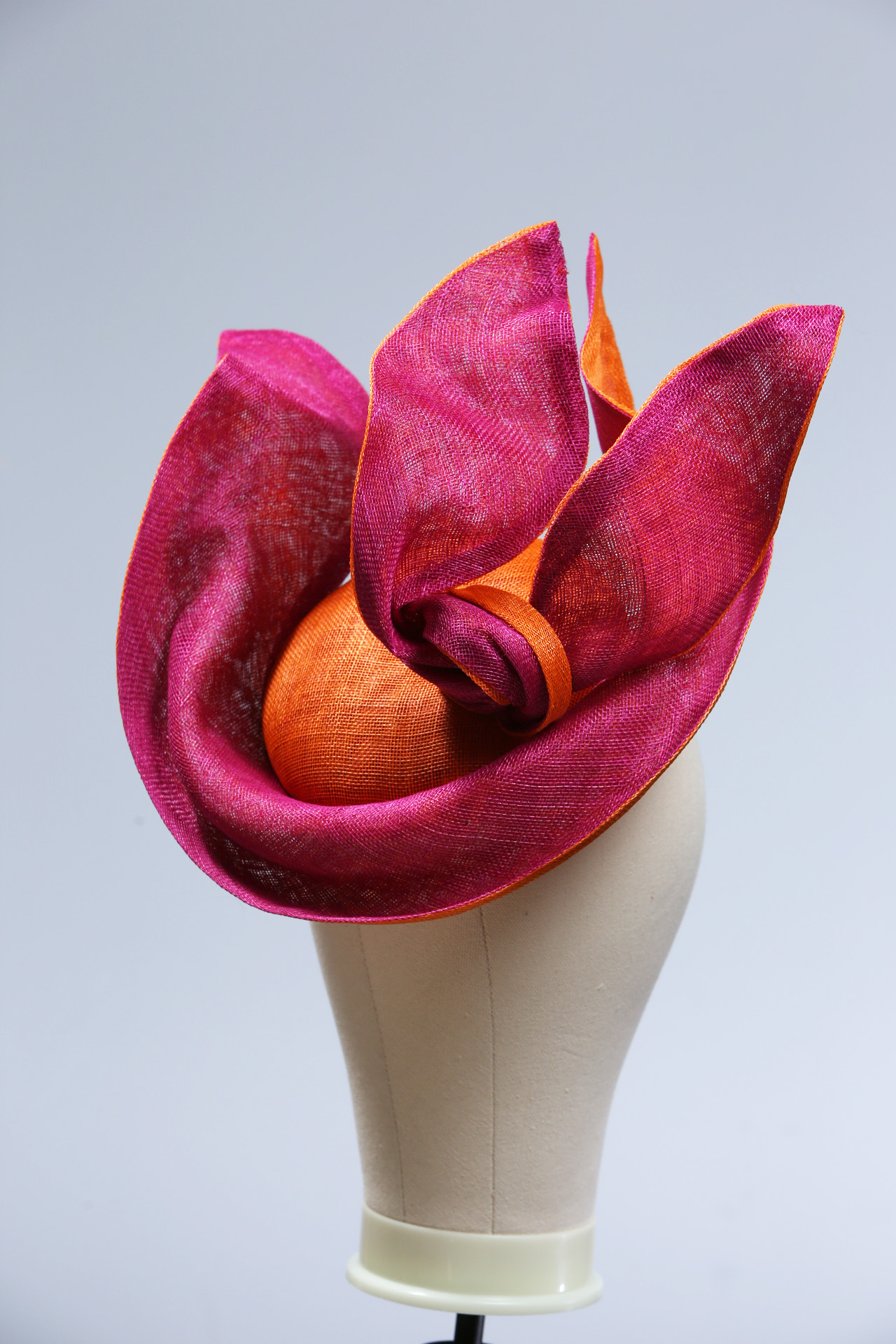 Hot pink and Orange Saucer twisted set on a button fascinator base hat (16) Hot Pink sinamay saucer hat set on a orange button pillbox fascinator