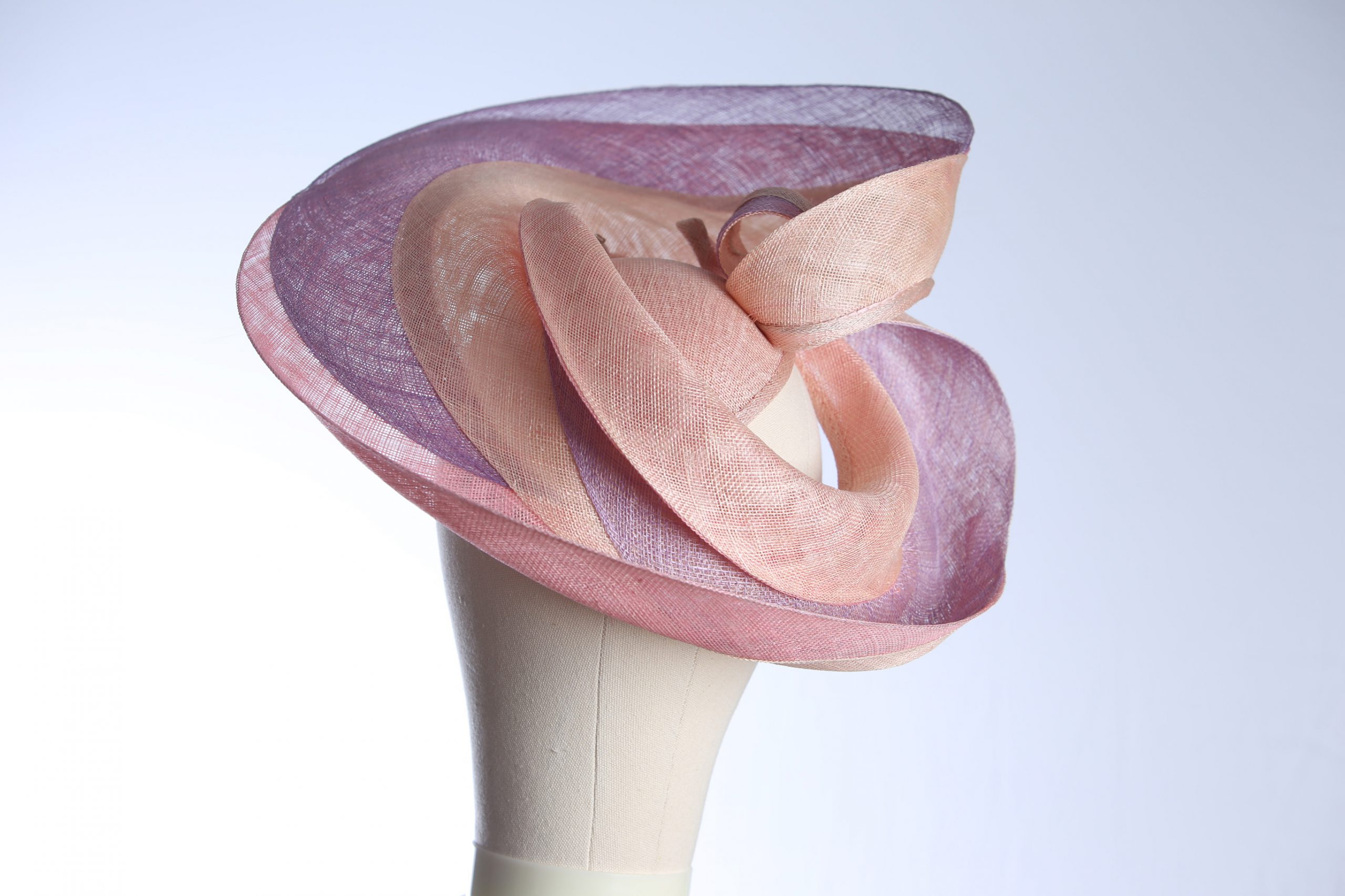 Pink lilac and oyster sinamay swirl fascinator hat set on a teardrop base (4) Pink lilac and oyster sinamay swirl fascinator hat set on a teardrop base