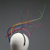 Rainbow multi-coloured quill floating fascinator hat set on a headband