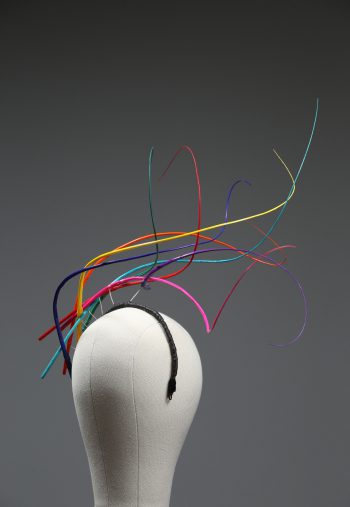 Rainbow multi-coloured quill floating fascinator hat set on a headband