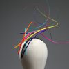 Rainbow multi-coloured quill floating fascinator hat set on a headband