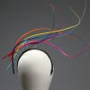 Rainbow multi-coloured quill floating fascinator hat set on a headband