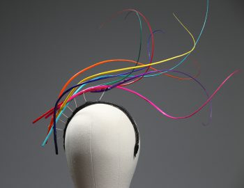 Rainbow multi-coloured quill floating fascinator hat set on a headband