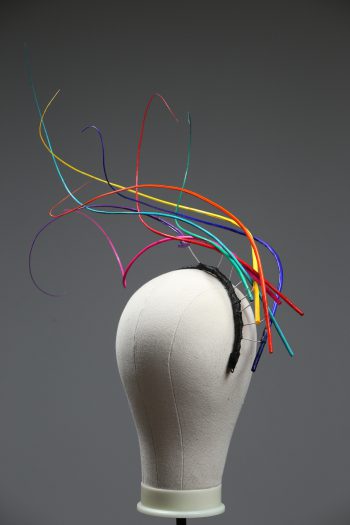 Rainbow multi-coloured quill floating fascinator hat set on a headband