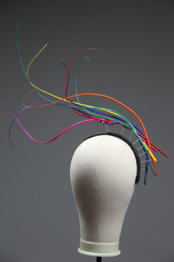 Rainbow multi-coloured quill floating fascinator hat set on a headband