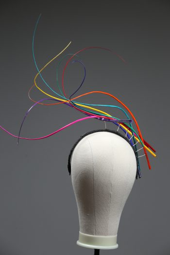 Rainbow multi-coloured quill floating fascinator hat set on a headband