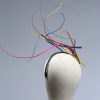 Rainbow multi-coloured quill floating fascinator hat set on a headband