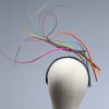 Rainbow multi-coloured quill floating fascinator hat set on a headband