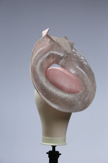 Pale dusky pink button pillbox hat with a silver shimmery lurex saucer