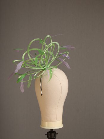 Ladies' formal Apple lime green and Lilac medium feather and satin loop fascinator hat. Suitable for a wedding or ladies' day at the races