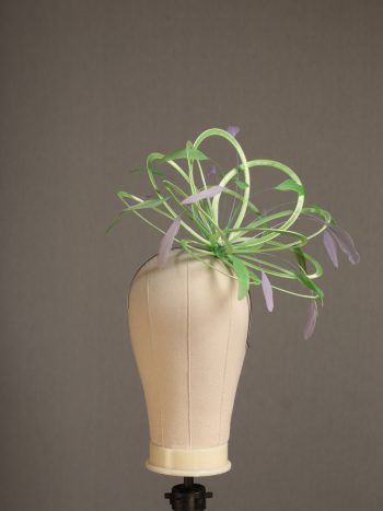 Ladies' formal Apple lime green and Lilac medium feather and satin loop fascinator hat. Suitable for a wedding or ladies' day at the races