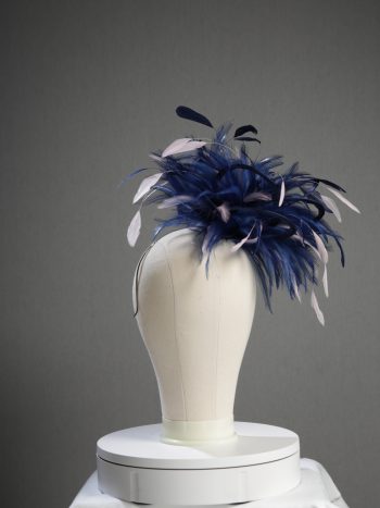 Ladies formal Navy Blue and Baby Pink medium feather and satin loop fascinator hat. Suitable for a wedding or ladies day at the races