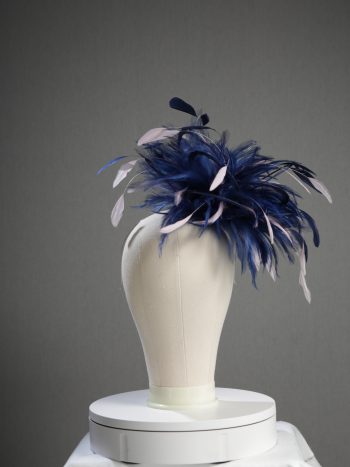 Ladies formal Navy Blue and Baby Pink medium feather and satin loop fascinator hat. Suitable for a wedding or ladies day at the races