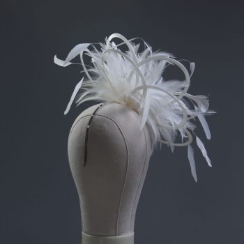 Ladies formal Ivory medium feather and satin loop fascinator hat. Suitable for a wedding or ladies day at the races