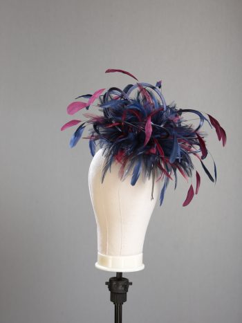 Ladies' formal Navy Blue and Burgundy Wine medium feather and satin loop fascinator hat. Suitable for a wedding or ladies' day at the races