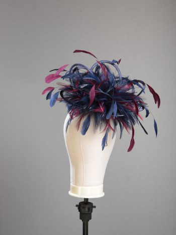 Ladies' formal Navy Blue and Burgundy Wine medium feather and satin loop fascinator hat. Suitable for a wedding or ladies' day at the races