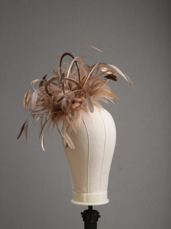 Ladies' formal Taupe Nude and Gold medium feather and satin loop fascinator hat. Suitable for a wedding or ladies' day at the races