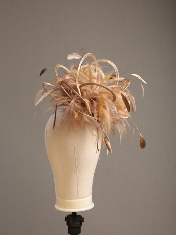 Ladies' formal Taupe Nude and Gold medium feather and satin loop fascinator hat. Suitable for a wedding or ladies' day at the races