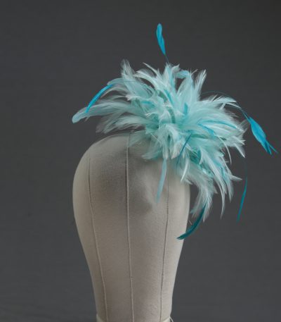 Ladies wedding or races aqua and turquoise small feather and satin loop fascinator hat